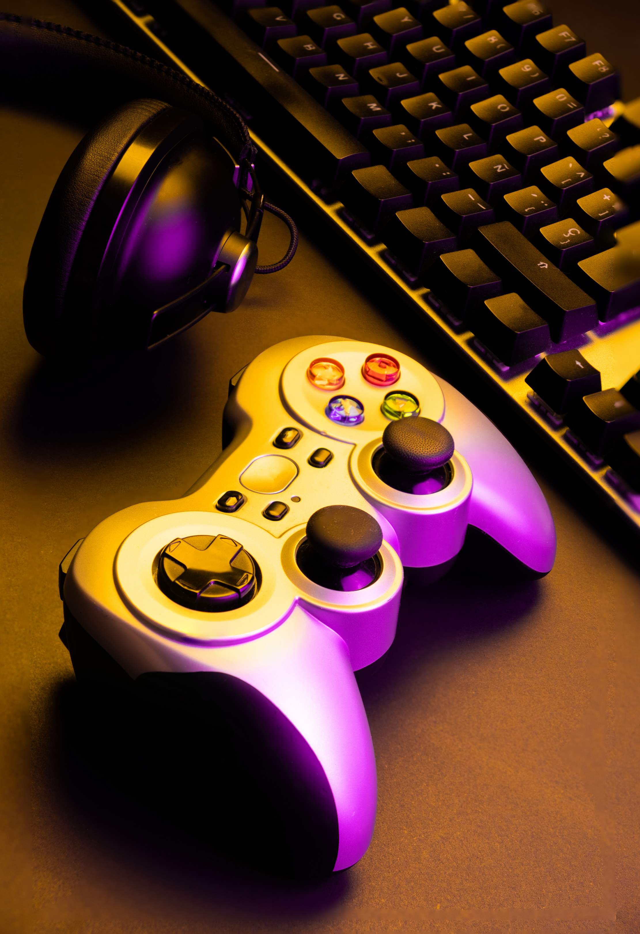 Gaming controller, headphones, keyboard, and mouse for multiplayer play
